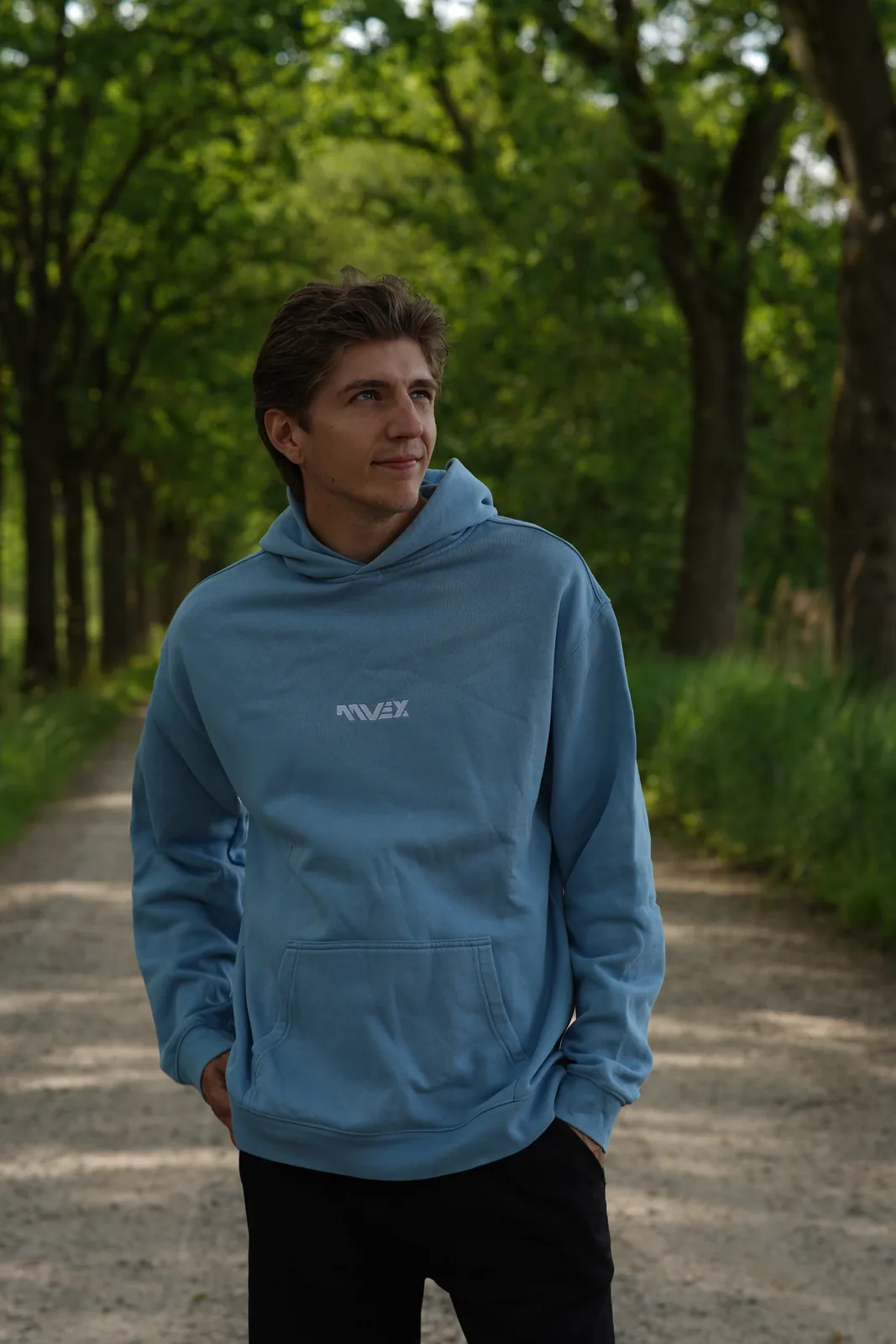 AAVEX in a hoodie